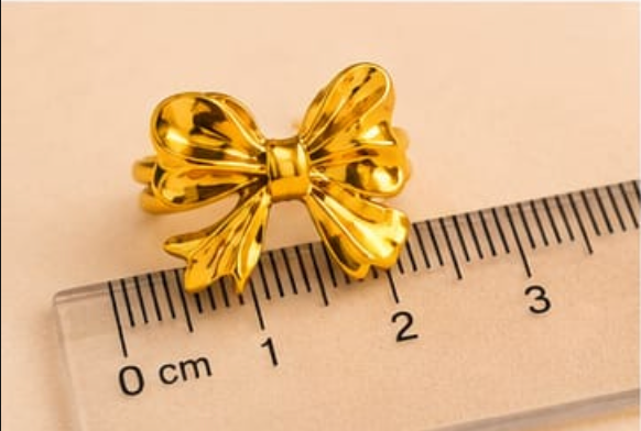 Golden Bow Statement Ring